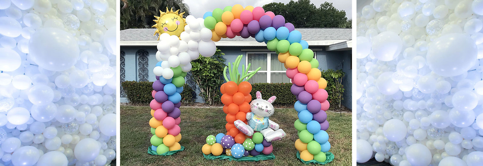 Easter Rainbow Balloon Arch with clouds and sun and The Easter Bunny under the rainbow with a large carrot. Balloons Melbourne FL