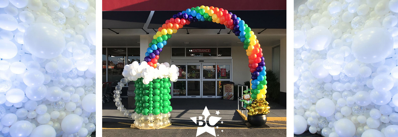 St Patrick's Day Balloon Arch Colorful rainbow arch coming out of a 5 foot tall balloon green beer mug sculpture going over the doorway to a store into a pot of gold with leprechaun. Balloons West Melbourne FL