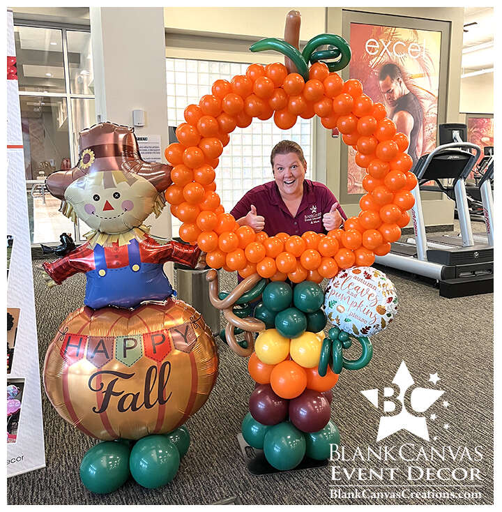 Christine posing with our pumpkin shaped mini balloon photo frame photo op in West Melbourne FL